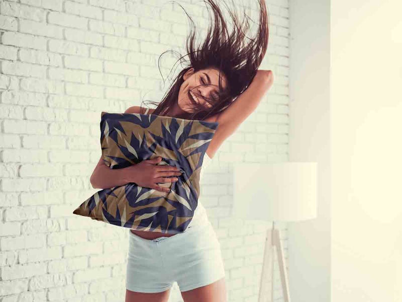 Health pillow, brown with blue leaves.
