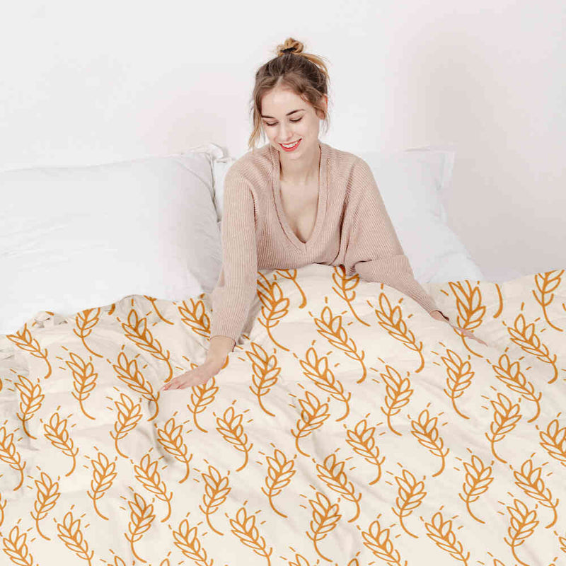 Set di biancheria da letto con coperta terapeutica bianca con grano giallo