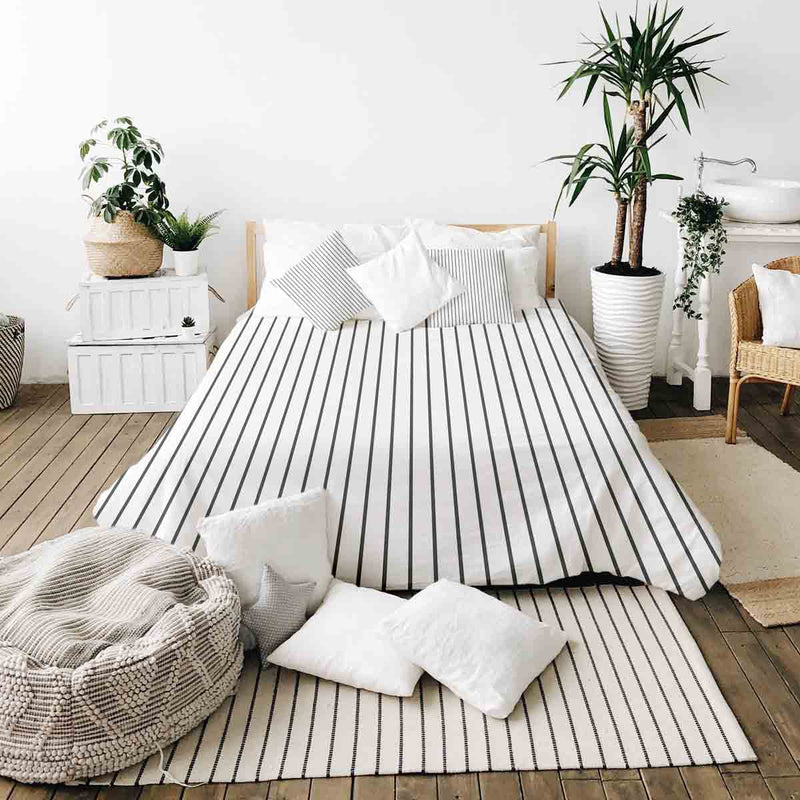 Therapy blanket bedding set, white with black stripes.