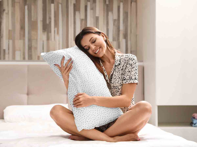 Health pillow with small black dots