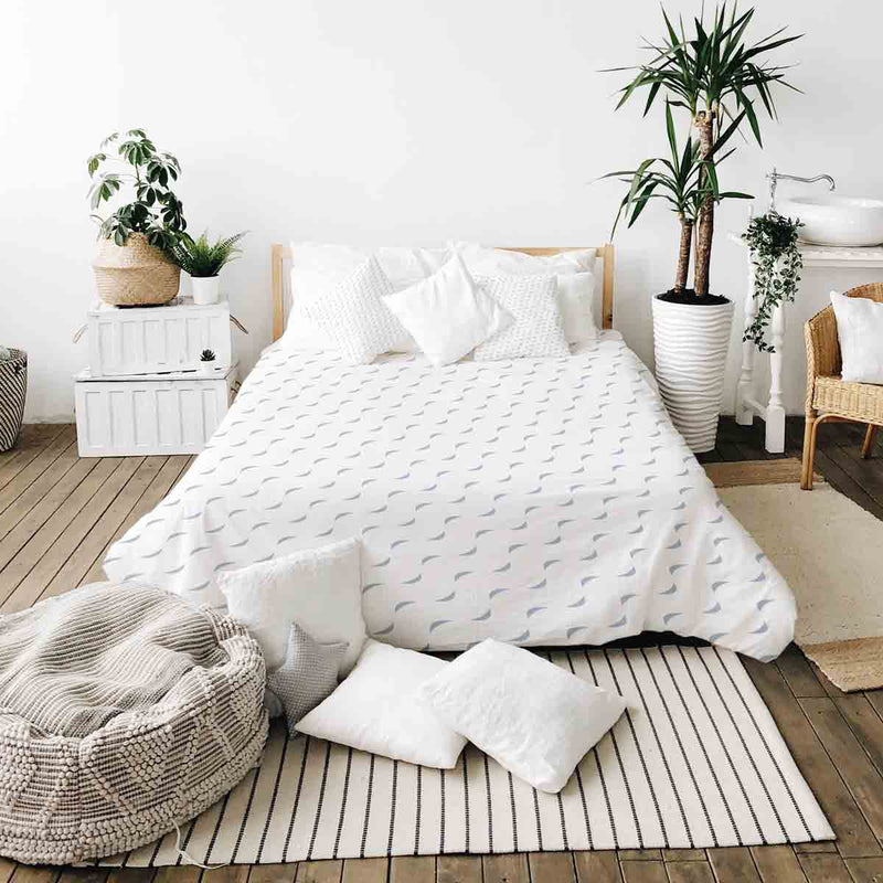 Therapy blanket and bedding set, white with blue waves.