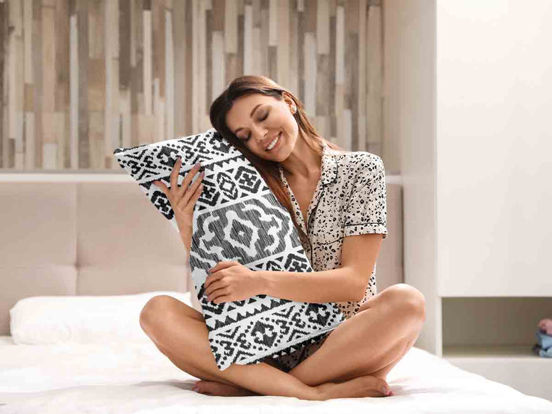 Health pillows with black shapes