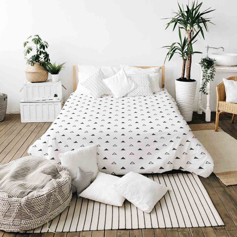 Therapy blanket and bedding set, white with black triangles.