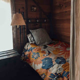 Set di biancheria da letto con coperta terapeutica e fiori di gerbera