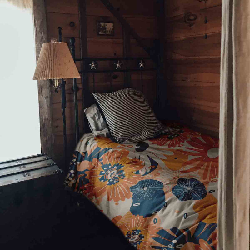 Set di biancheria da letto con coperta terapeutica e fiori di gerbera