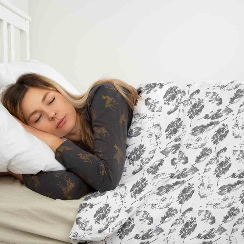 Therapy blanket and bedding set, white with grey leaves.