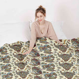 Therapy blankets and bedding set with colorful animal heads.