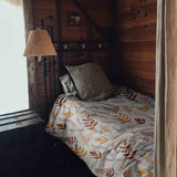 Therapy blankets and bedding set, white with autumnal branches.