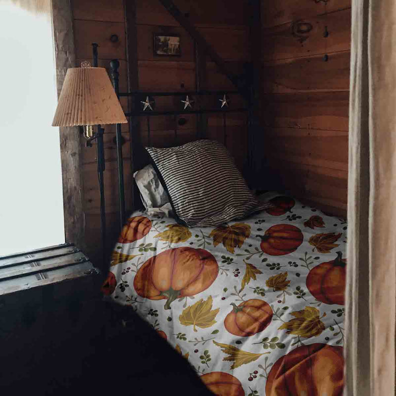 Therapy blanket and bedding set, white with large pumpkins.