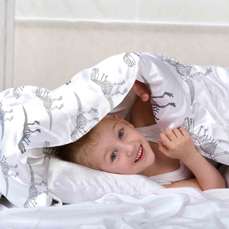 Therapy blanket bedding set, white with dinosaur skeleton.