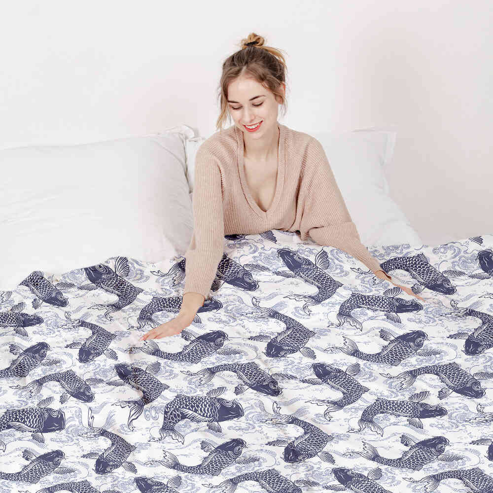 Set de ropa de cama con manta terapéutica y kois azules