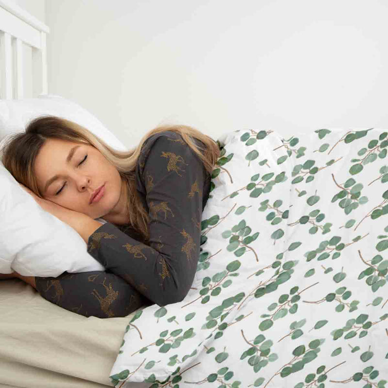 Therapy blanket bedding set, white with eucalyptus branches.